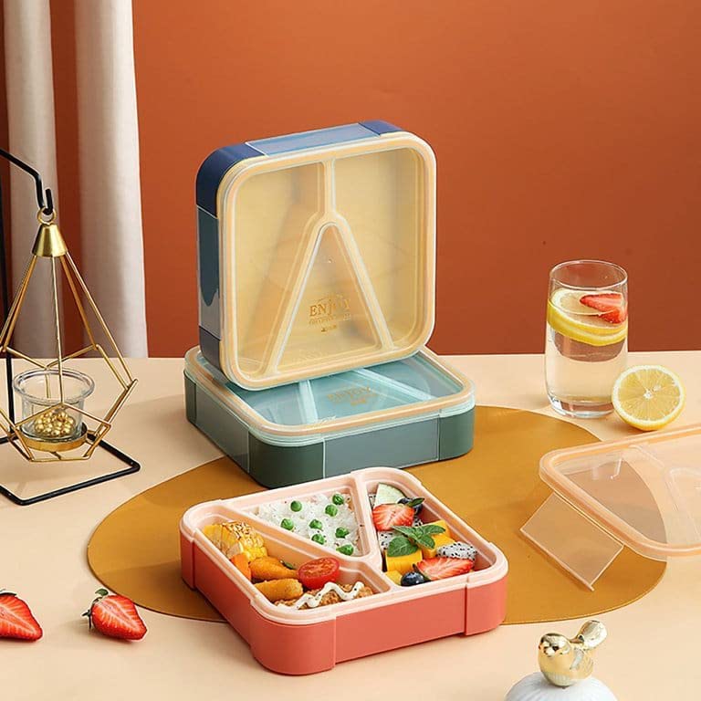 Colorful divided lunch boxes for kids, promoting healthy and organized meals for school or picnics. www.usmile.toys